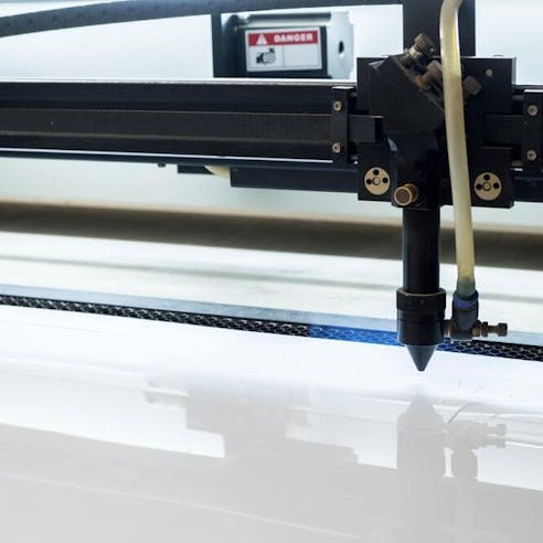 Cutting machine carving patterns. Image Credit: Shutterstock.com/John99