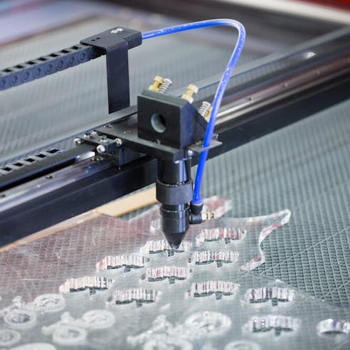 Acrylic sheet carving machine. Image Credit: Shutterstock.com/socrates471