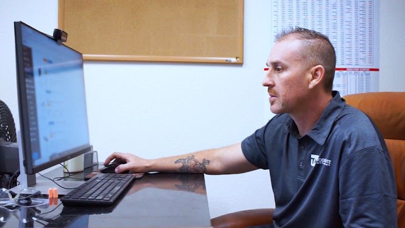 A CNC machinist on Xometry's Manufacturing Partner Network