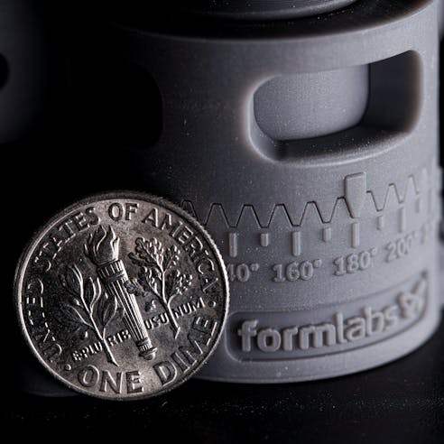 Formlabs Grey Resin with a dime for detail reference