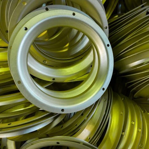 Metal stamped parts with sulfur-oxidated anodize finish. Image Credit: Shutterstock.com/teh_z1b