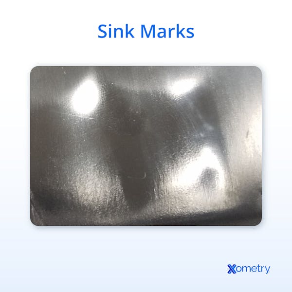 A photograph showing an example of sink marks
